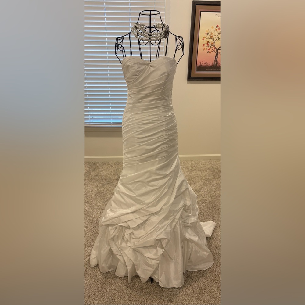 Alfred Angelo Disney Princess Wedding Dress-Repunzel is the name of the dress.
